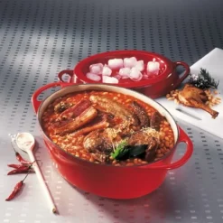 Cocotte fonte ovale Doufeu 32 cm 7,2 L cerise Le Creuset